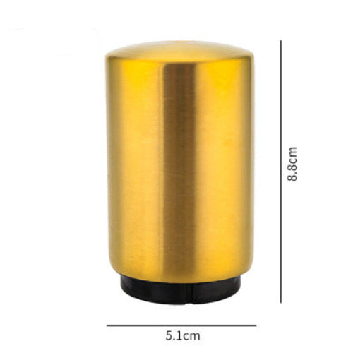 Gold cylindrical beer bottle opener with dimensions labeled on a white background