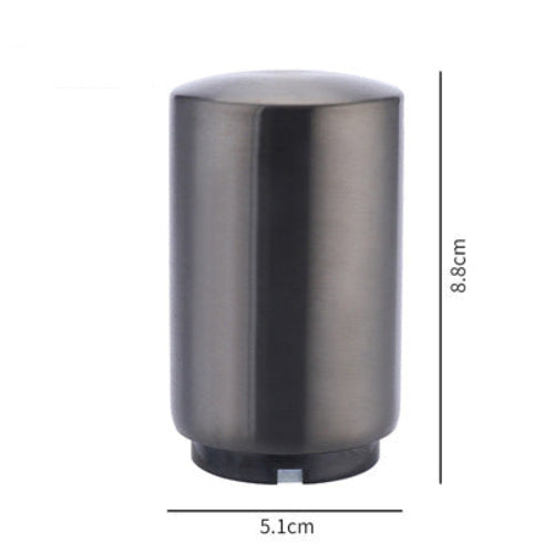 Metallic cylindrical beer bottle opener with dimensions labeled on a white background