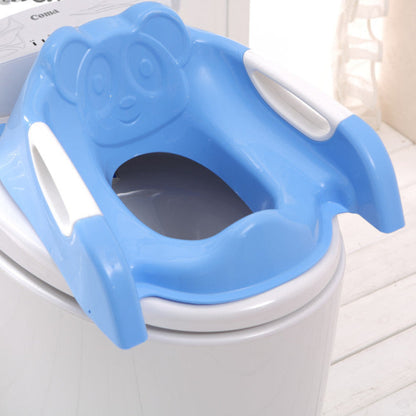Blue children's toilet seat with panda design on a white toilet