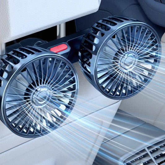 Car-mounted fan with visible blades and a red button, placed on a car seat.