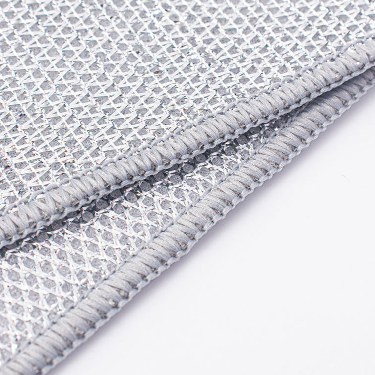 Close-up of a non-scratch wire dishcloth with a white background