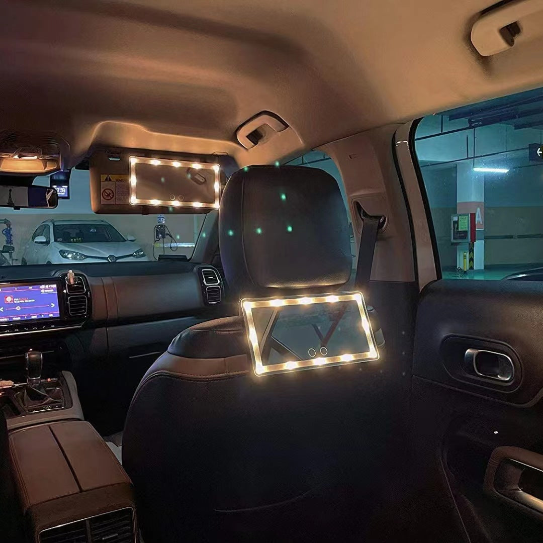 Car interior with a headrest cover illuminated by LED lights