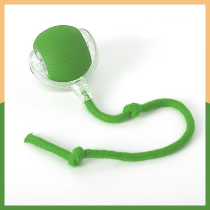 Green silicone cat ball toy with a rope on a white background